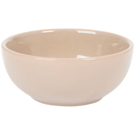 Šteniatko a miska s krmivom