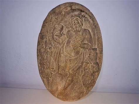 Antický reliéf zobrazujúci Sizyfa