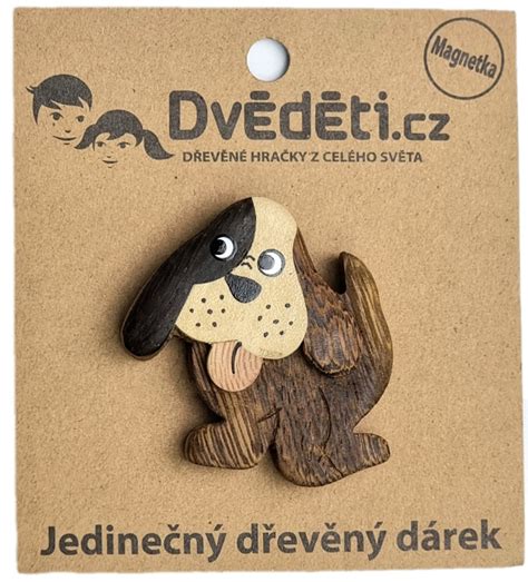 Pes žúva drevený konár