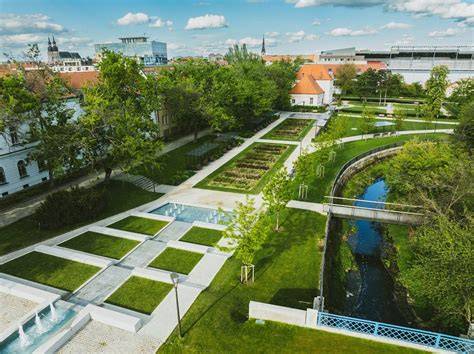 Ružový park - pes na vôdzke pri chodníku